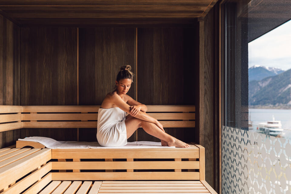 woman in the sauna at the lake