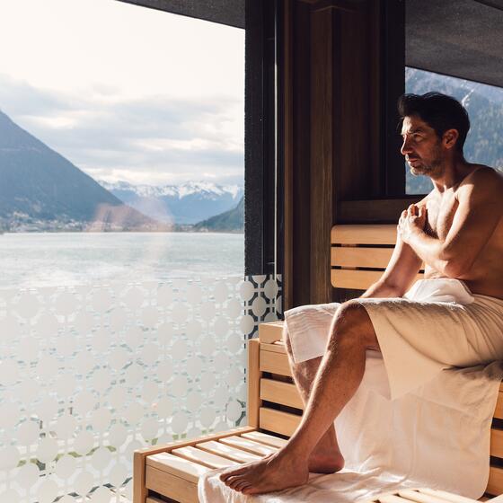 sauna with view of mountains and lake