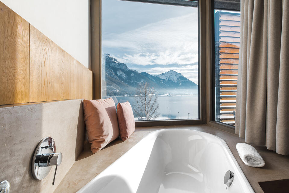 bathtub with lake view